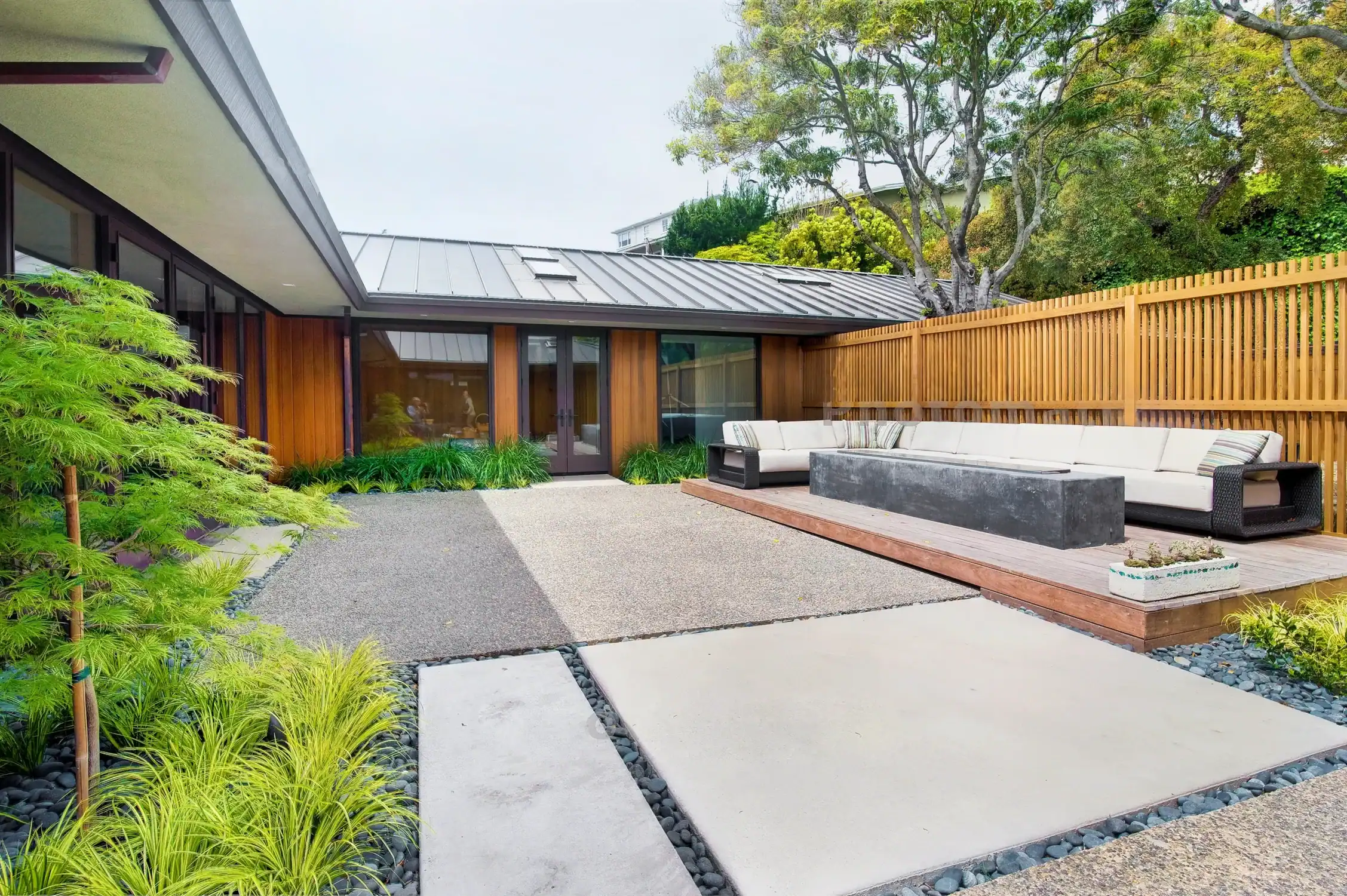 Mid-century home exterior and courtyard, repainted