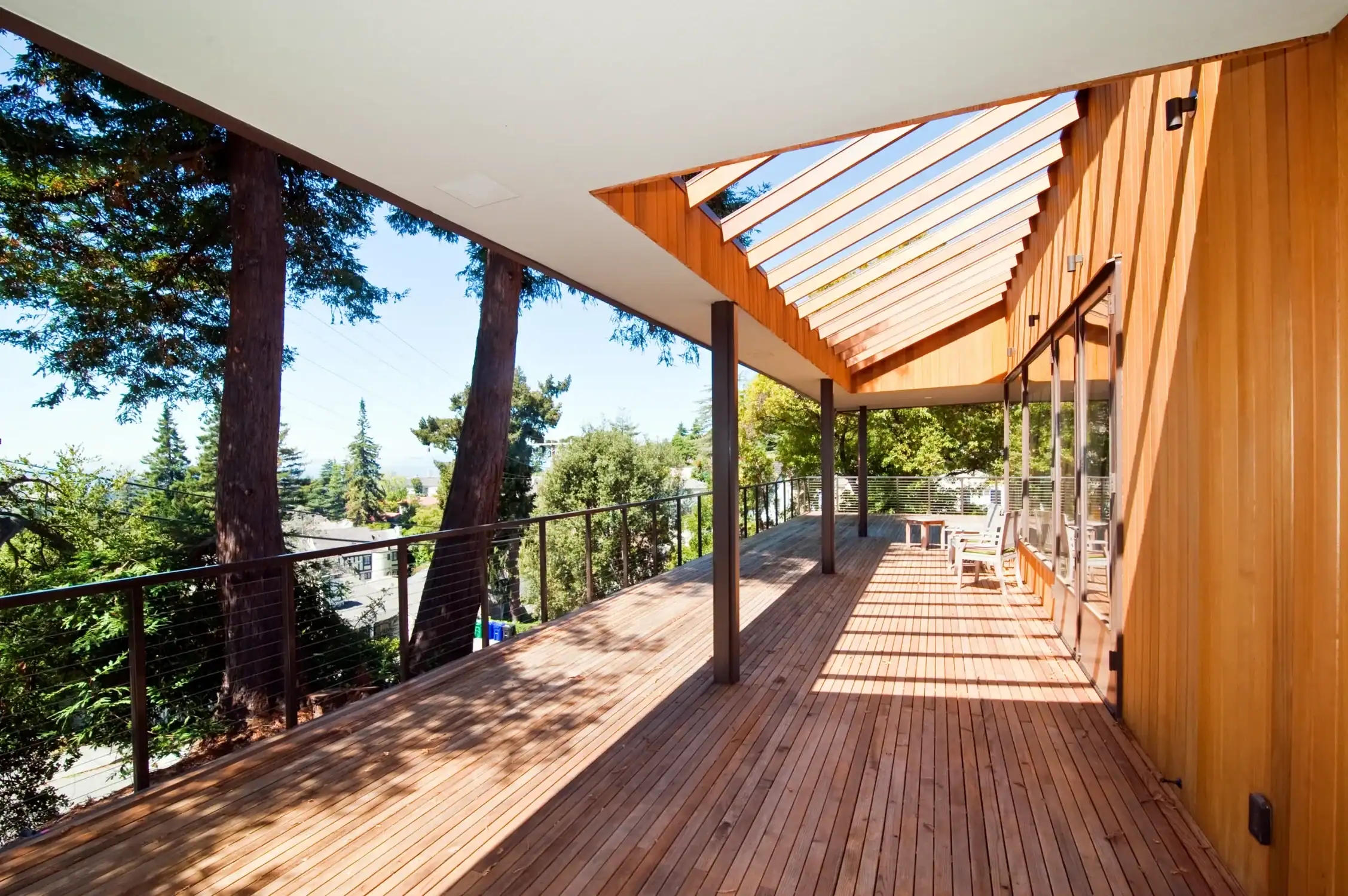 Redwood deck restored and finished, with a Bay Area hillside view